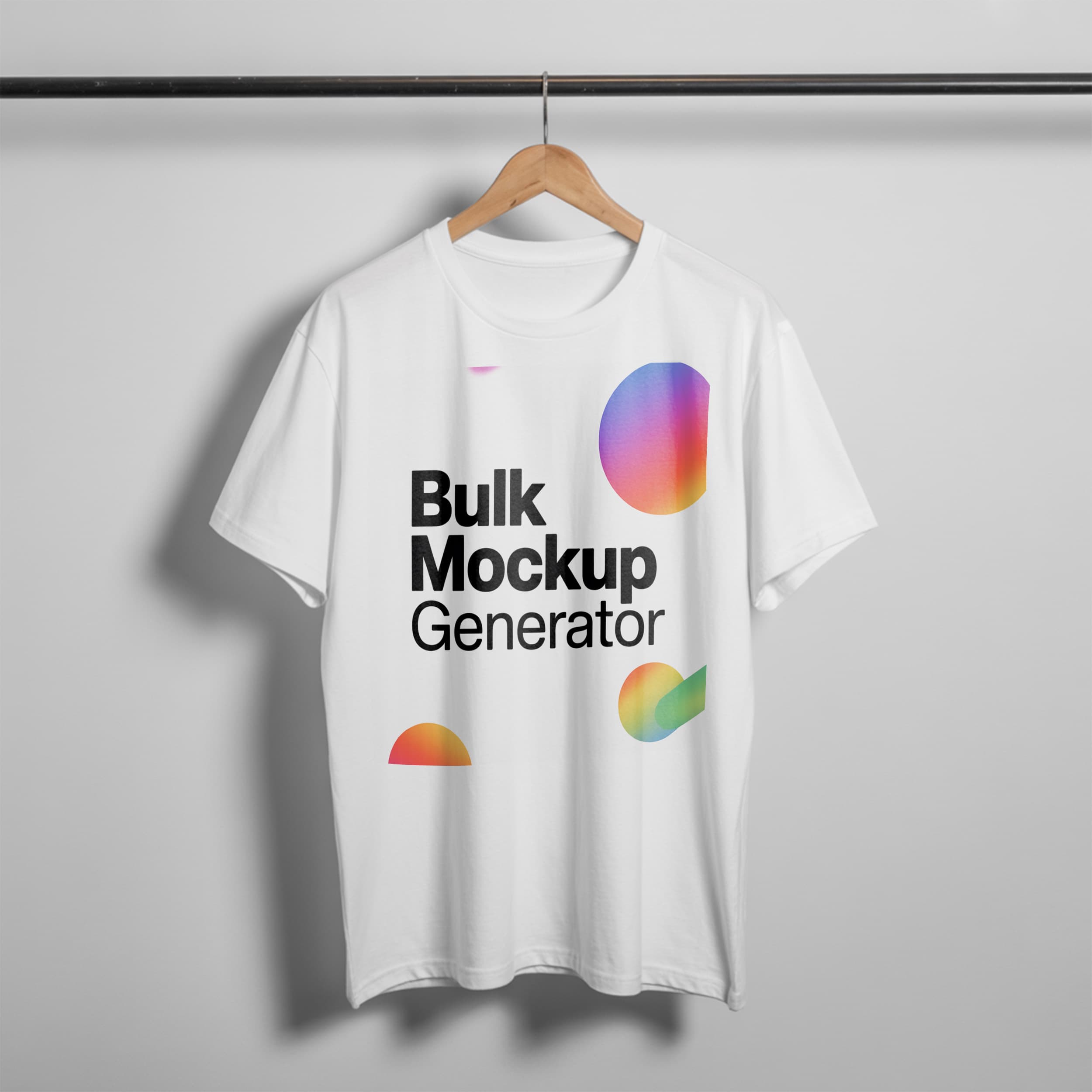 White T-Shirt Hanging on Rack